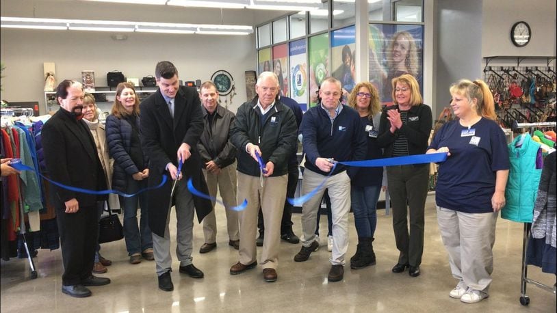 People gathered Friday morning to cut a ribbon to celebrate the new Goodwill store in Hamilton. It opened in late December. PROVIDED