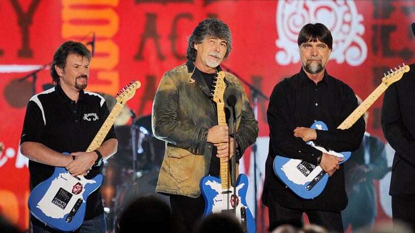 LAS VEGAS, NV - DECEMBER 05:  (L-R) Musicians Jeff Cook, Randy Owen and Teddy Gentry of the band Alabama accept the Greatest Hits Award onstage at the American Country Awards 2011 at the MGM Grand Garden Arena on December 5, 2011 in Las Vegas, Nevada.  (Photo by Ethan Miller/Getty Images)