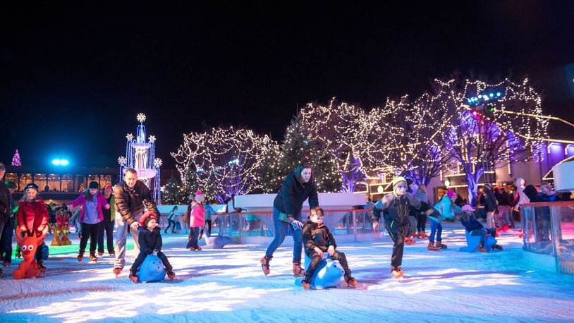 Kings Island WinterFest 2023 has 20 rides open, just as many live entertainment shows, crafts for kids, a sledding hill, ice skating and more. The Eiffel Tower is lit as a giant Christmas tree and there is a nightly holiday parade. WinterFest is open on select nights through the end of December. PHOTOS: KINGS ISLAND/CONTRIBUTED