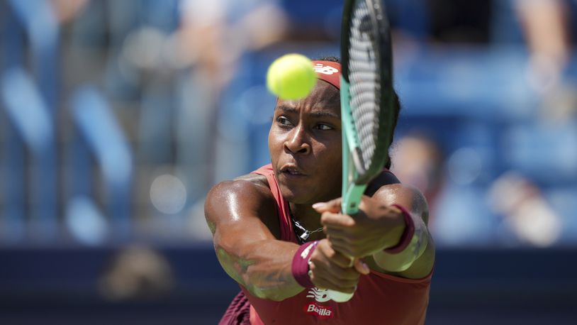 FILE - Coco Gauff returns a shot to Karolina Muchova, of the Czech Republic, during the women's singles final of the Western & Southern Open tennis tournament, Sunday, Aug. 20, 2023, in Mason, Ohio. Gauff is one of the women to watch at the U.S. Open, which begins at Flushing Meadows on Aug. 28.(AP Photo/Aaron Doster, File)