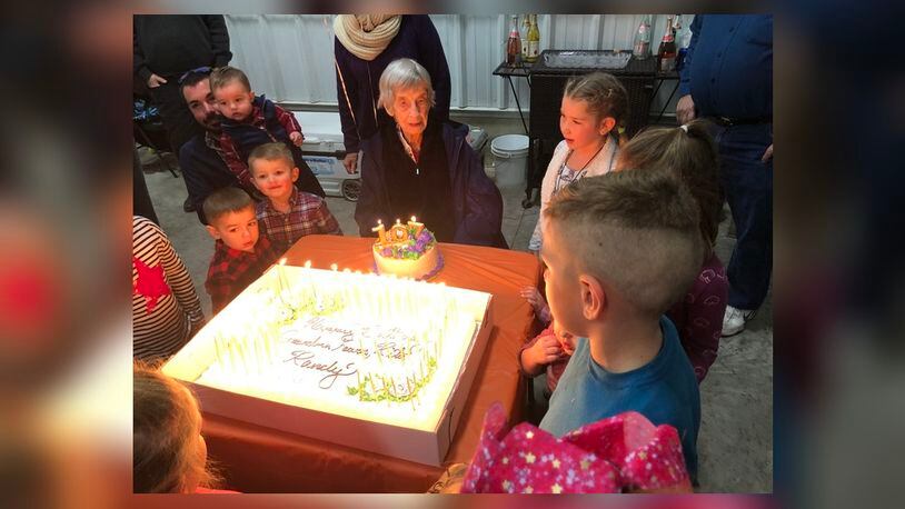 Fearn Gerber’s family lit 107 candles for her 107th birthday celebration Saturday in her home. Five-inch candles were lit with a lighter and they were blown out by Gerber and 16 of her great-great-grandchildren. SUBMITTED PHOTO