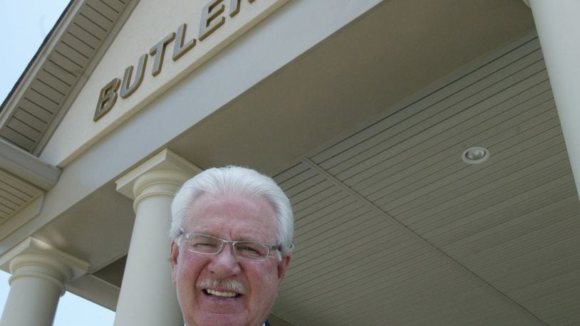 Carlos Todd, shown on the steps of the the-new GOP headquarters in 2006, at the end of his tenure as the executive chairman of the Butler County Republican Party.