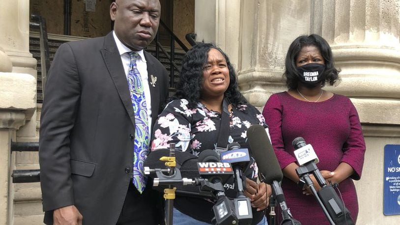 Tamika Palmer, mother of Breonna Taylor, addresses the media in Louisville, Ky. on Thursday, Aug. 13, 2020. Five months after her daughter was shot to death by police, Palmer said she is trying to be patient while waiting to hear if the officers will be charged. (AP Photo/Dylan Lovan)