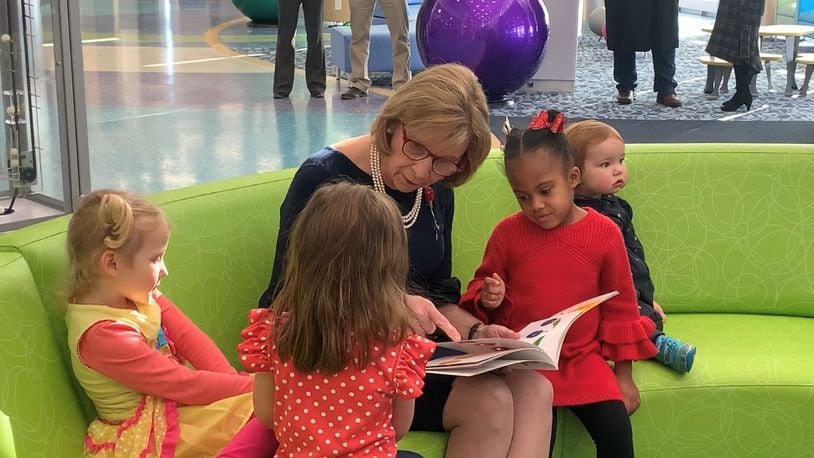 Ohio First Lady Fran DeWine reads to children during a Dec. 18 visit to Dayton Children’s Hospital. SARAH CAVENDER/STAFF PHOTO