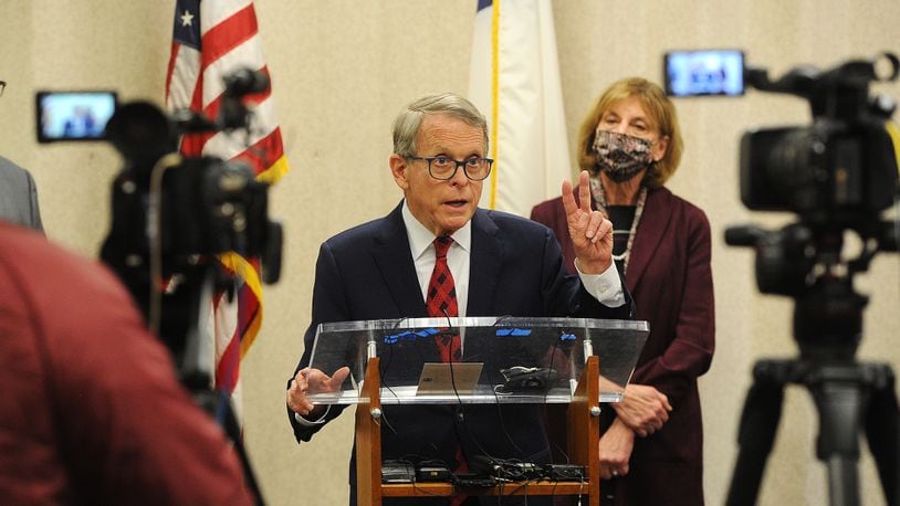 Ohio Gov. Mike DeWine is in Dayton March 8, 2021 visiting the Bethesda Temple vaccination site on Salem Avenue in Harrison Twp. MARSHALL GORBY\STAFF