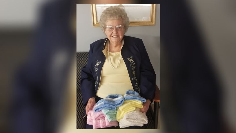 In her 28 years as a volunteer for Atrium Medical Center, Betty Banks has knitted 6,000 baby hats and 50 afghans for local newborns.