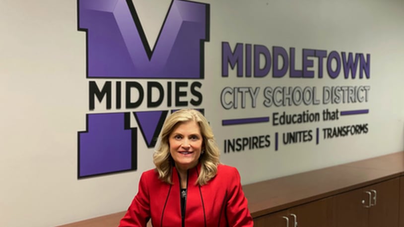 The leaders of one of Butler County’s largest school systems decided to stay with a veteran district administrator in picking its next superintendent. 	Deborah Houser was chosen Monday evening by the Middletown Board of Education as the new leader of city school district. She is the first female superintendent in the school system's 170-year history. (Provided Photo\Journal-News)
