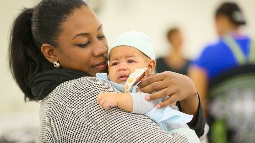 UPDATED CUTLINE FOR OHJN 112516 INFANT MORTALITY: The infant mortality rate for black babies is not improving in Butler County. Raven Smith and her son, Donald, participated this year in High Hopes, a Butler County program aimed at reducing the infant mortality rate. GREG LYNCH / STAFF