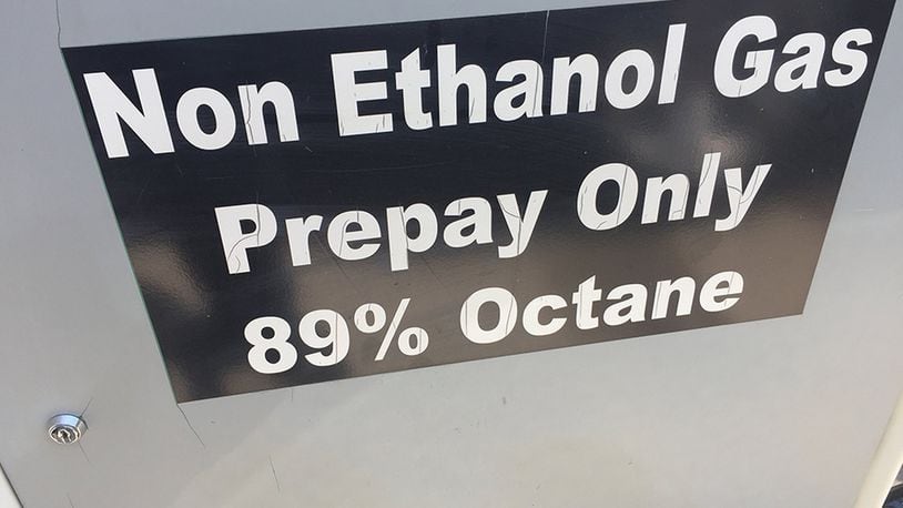 A gas pump located away from the main pumps is labeled to be ethanol free. Ethanol is more expensive than regular gasoline. James Halderman photo