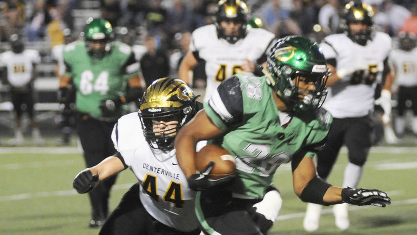 Centerville’s Max Wynn (left) closes on Northmont’s Devin Kenerly in a Week 8 GWOC crossover game last season. Wynn led the Elks with 96 total tackles in 2017. MARC PENDLETON / STAFF