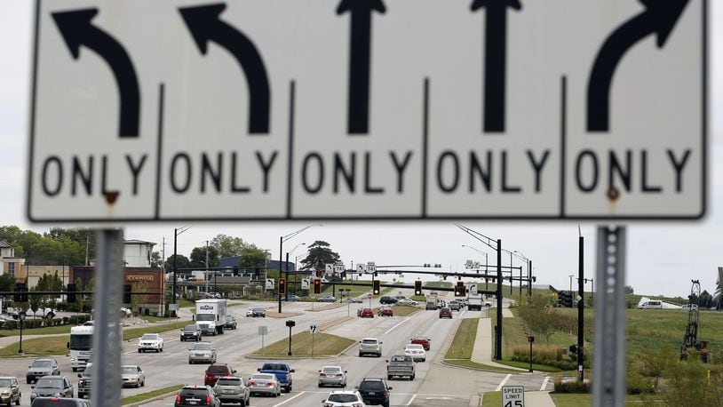 The speed limit on all public roads in Austin Landing has been lowered from 45 miles per hour to 25 mph as part of a series of safety measures sought by VisCap Development, which oversees the complex in Miami Twp. TY GREENLEES / STAFF