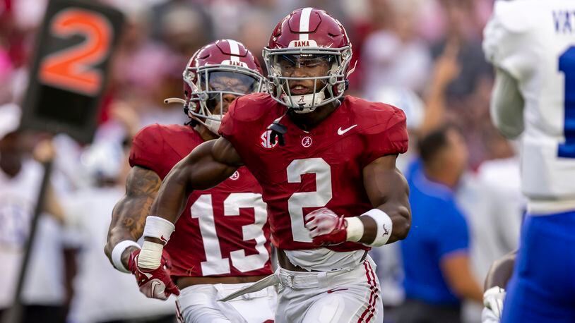 Alabama defensive back Caleb Downs (2) celebrates a stop against Middle Tennessee during the first half an NCAA college football game Saturday, Sept. 2, 2023, in Tuscaloosa, Ala. (AP Photo/Vasha Hunt)