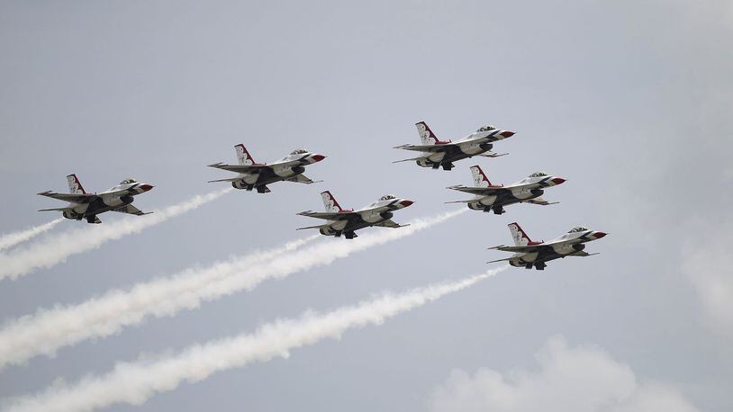 The United States Air Force Thunderbirds returned to the Dayton Air Show on Thursday after a four-year absence due in part to military budget cuts. The team is scheduled to perform on Saturday and Sunday at the Dayton International Airport. TY GREENLEES / STAFF