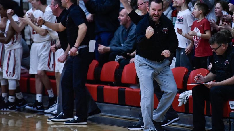 Franklin coach Brian Bales reacts to a positive play for his team during Friday night’s game against Valley View at Darrell Hedric Gym in Franklin. NICK GRAHAM/STAFF
