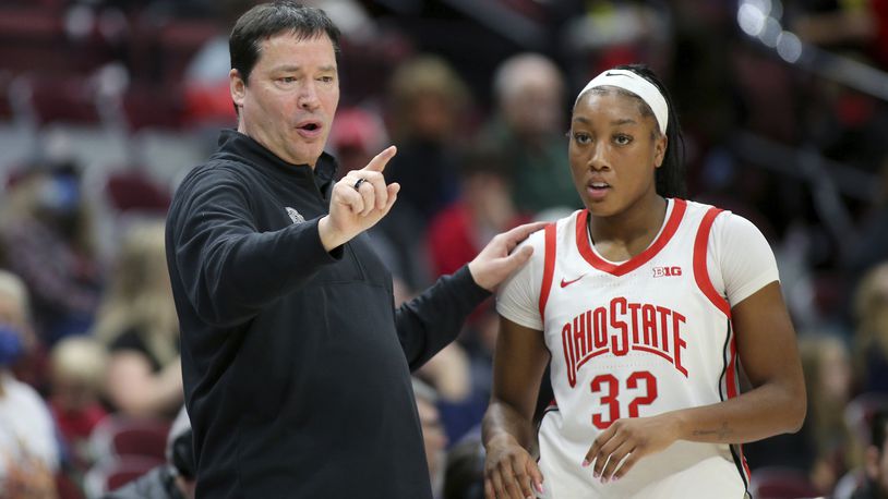 Ohio State head coach Kevin McGuff coaches Ohio State forward Cotie McMahon (32) during the third quarter of an NCAA college basketball game against New Hampshire in Columbus, Ohio, on Thursday, Dec. 8, 2022. (AP Photo/Joe Maiorana)