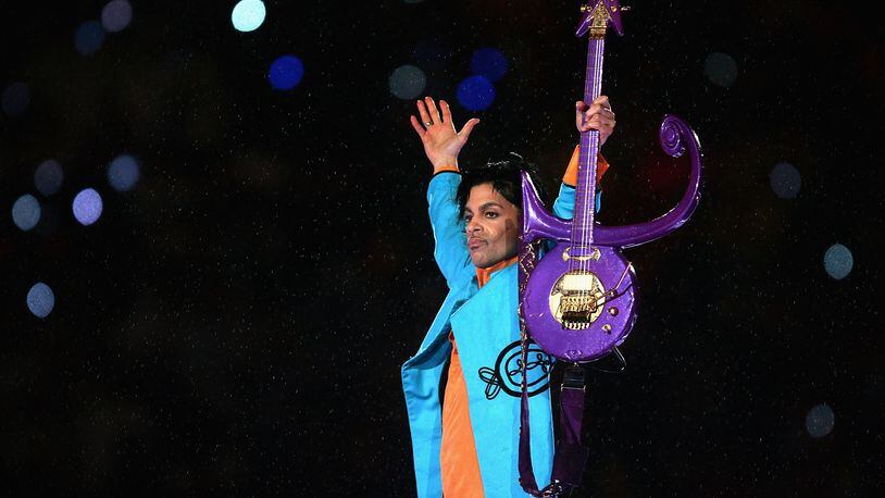 MIAMI GARDENS, FL - FEBRUARY 04: Prince performs during the 'Pepsi Halftime Show' at Super Bowl XLI between the Indianapolis Colts and the Chicago Bears on February 4, 2007 at Dolphin Stadium in Miami Gardens, Florida. Prince, who died at age 57 in April 2016, is the subject of a family's holiday light display in Minnesota. (Photo by Jonathan Daniel/Getty Images)