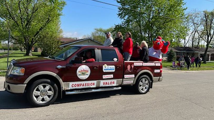 The annual Joe Nuxhall Miracle League Fields Opening Day Parade was held April 22, 2023. Ed Hartman was this year’s grand marshal. The parade went through the local neighborhood and ended at the fields on Groh Lane. A short on-field ceremony followed, with local vocalist Kim Beatty performing the national anthem. AMY BURZYNSKI/STAFF