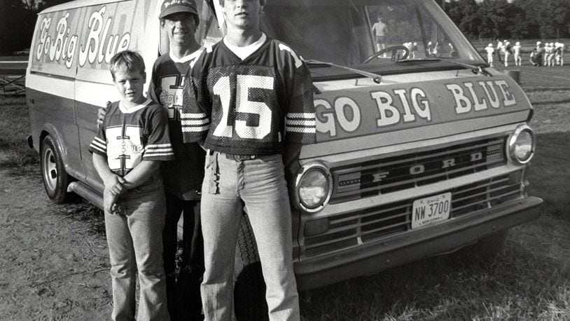 The Big Blue van with dad Bill Lobitz and sons Bill, 10, and Dan, 17, at a football game in this undated photo.