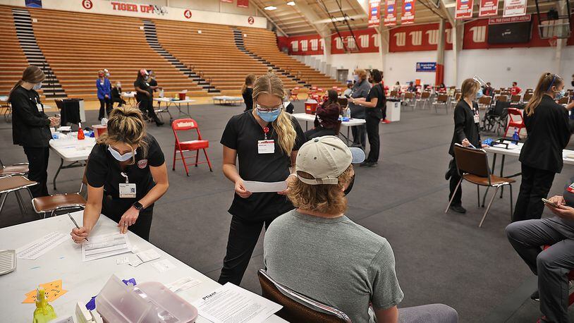 A COVID vaccination clinic was set up in the Pam Evans Smith Arena at Wittenberg University to vaccinate students. BILL LACKEY/STAFF