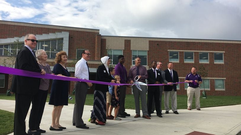 School and city officials cut the ribbon Saturday morning as Middletown Middle School opened to the public. Students return to school Tuesday.