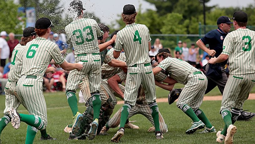 Badin High School players swarm the field after defeating Highland in a Division II regional baseball final at Mason June 6, 2021. Badin won 12-3. Contributed photo by E.L. Hubbard