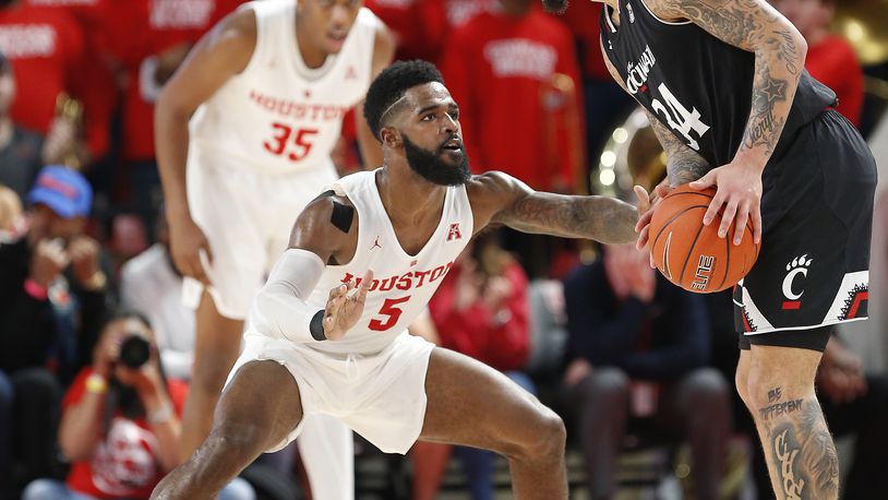 HOUSTON, TEXAS - FEBRUARY 10: Corey Davis Jr. #5 of the Houston Cougars faces up Jarron Cumberland #34 of the Cincinnati Bearcats during the second half at Fertitta Center on February 10, 2019 in Houston, Texas. (Photo by Bob Levey/Getty Images)