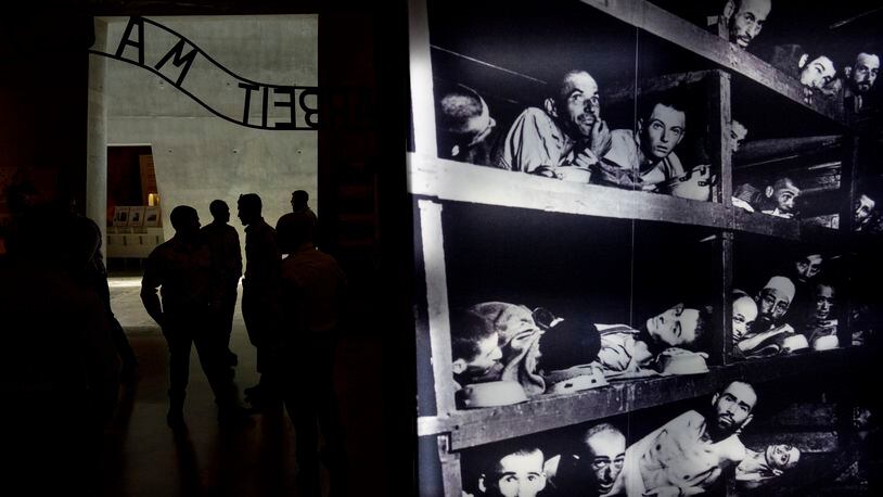 People visit the Yad Vashem Holocaust Memorial Museum in Jerusalem, Sunday, May 5, 2024. The annual Israeli memorial day for the 6 million Jews killed in the Holocaust of World War II begins at sundown on Sunday. (AP Photo/Ohad Zwigenberg)