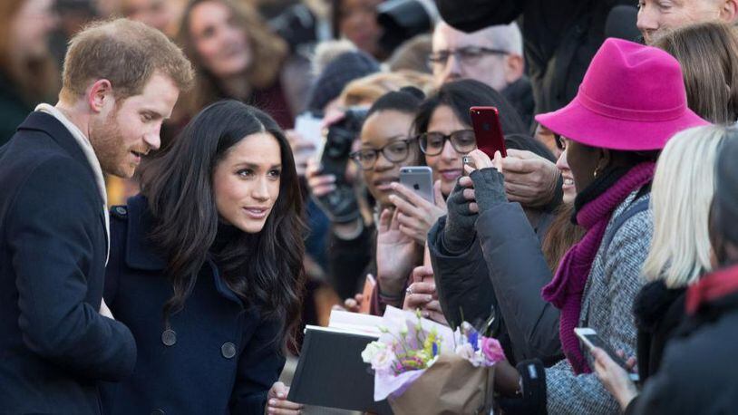 NOTTINGHAM, ENGLAND - DECEMBER 01:  Prince Harry and fiancee Meghan Markle arrive at the Terrance Higgins Trust World AIDS Day charity fair at Nottingham Contemporary on December 1, 2017 in Nottingham, England. Prince Harry and Meghan Markle announced their engagement on Monday 27th November 2017 and will marry at St George's Chapel, Windsor Castle in May 2018.  (Photo by Christopher Furlong/Getty Images)
