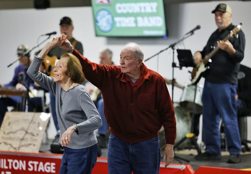 Barry Moran and Ruth Templeton dance to the music of Standard Country Time Band at Pohlman Lanes Wednesday, Jan. 12, 2022 in Hamilton. Pohlman Lanes has turned some of their bowling lanes into multi-use space with a stage, tables and room for dancing and other activities. NICK GRAHAM / STAFF