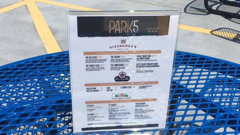 Hamilton’s Park5 area, atop the city’s McDulin parking garage, has menus for three local eateries. MIKE RUTLEDGE/STAFF Hamilton’s Park5 area, atop the city’s McDulin parking garage, has menus for three local eateries. MIKE RUTLEDGE/STAFF