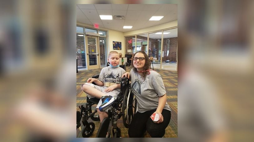 Rydder Ames, a 7-year-old from Hamilton seen here with his mother, Krista Stevens, was diagnosed with an aggressive and rare brain tumor, known as Diffuse Midline Glioma (DMG) in April. He has since been receiving treatment while his family does whatever it can to help him. CONTRIBUTED