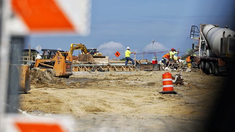 Construction continues on the Ohio 129 extension and I-75 and Liberty Way interchange Monday, Aug. 8, 2022. NICK GRAHAM/STAFF