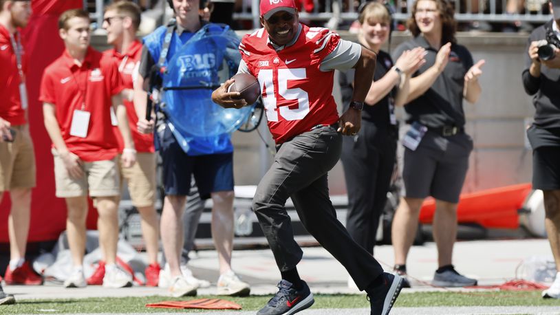Archie Griffin runs for a touchdown during a ceremonial play during Ohio State's NCAA college football Spring game Saturday, April 15, 2023, in Columbus, Ohio. (AP Photo/Jay LaPrete)