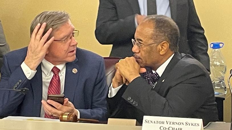 Ohio Redistricting Commission co-chairs House Speaker Bob Cupp, R-Lima (left) and state Sen. Vernon Sykes, D-Akron, talk after the March 1, 2022 meeting on congressional redistricting.