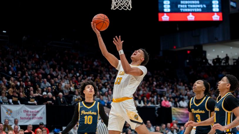 Centerville's Jonathan Powell scores inside against Toledo Whitmer in a Division I state semifinal at UD Arena on March 23, 2024. Logan Howard/CONTRIBUTED