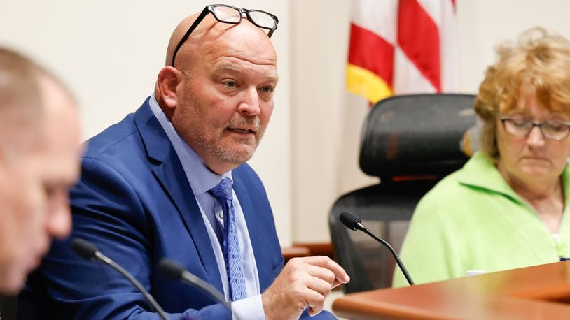 Hamilton City Council member Joel Lauer speaks out against the Miami Conservancy District's proposed assessment increases starting in 2025 during the council meeting on Wednesday, April 10, 2024, in Hamilton. NICK GRAHAM/STAFF