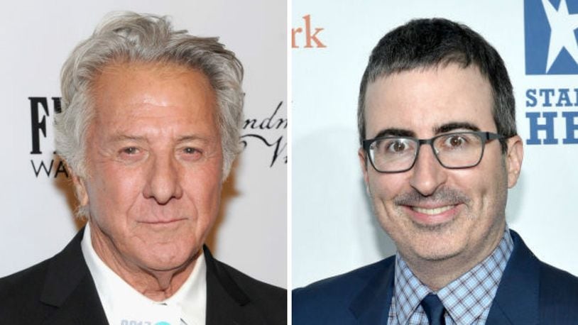 Dustin Hoffman (right) was called out by John Oliver for a sexual assault allegation during a panel discussion in New York Monday.