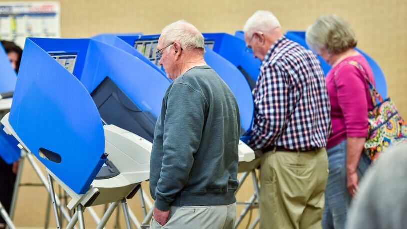 Early voting for the Nov. 8 general election begins on Wednesday at the Butler County Board of Elections office on Princeton Road. Pictured are voters casting early votes on March 14 in advance of the March 15 primary this past spring. NICK GRAHAM/FILE PHOTO