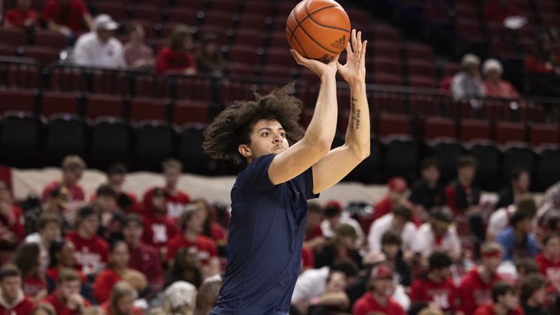 Michigan's George Washington III shoots while warming up before playing against Nebraska in an NCAA college basketball game Saturday, Feb. 10, 2024, in Lincoln, Neb. (AP Photo/Rebecca S. Gratz)