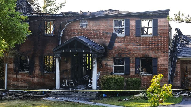 An early Sunday morning fire caused about $300,000 in damages to the structure and contents of this home at 5086 Mosiman Road in Madison Twp. NICK GRAHAM/STAFF