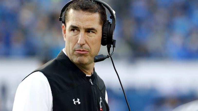 FILE - In this Dec. 7, 2019, file photo, Cincinnati head coach Luke Fickell watches from the sideline during the first half of an NCAA college football game against Memphis for the American Athletic Conference championship in Memphis, Tenn. The Bearcats return 16 starters from last year’s squad which went 9-1. (AP Photo/Mark Humphrey, File)