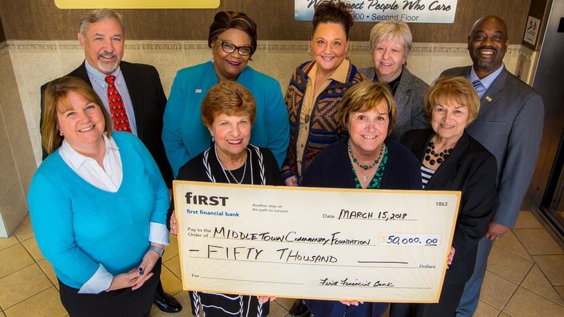 First Financial donated $50,000 to Middletown Community Foundation’s READY! Campaign. Back row, from left: Dan Sack, Robie Suggs, Amy Berlean, JoAnn Wagner and Roddell McCullough; Front row, from left: Kristen Mulligan, Carole Schul, Patricia Gage, and Elaine Garver. CONTRIBUTED