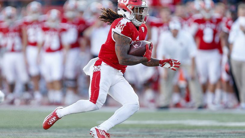 OXFORD, OH - OCTOBER 21: Kenny Young #3 of the Miami Ohio Redhawks runs with the ball after a reception against the Buffalo Bulls during the second half at Yager Stadium on October 21, 2017 in Oxford, Ohio. (Photo by Michael Reaves/Getty Images)
