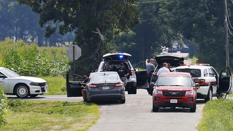 The area near Center and Smith roads was closed for hours during a standoff Thursday, Aug. 11, 2022, in Clinton County after an armed man tried to breach the FBI's Cincinnati office and fled north on Interstate 71. The unidentified suspect was shot and killed following a pursuit and standoff lasting roughly six hours. NICK GRAHAM/STAFF