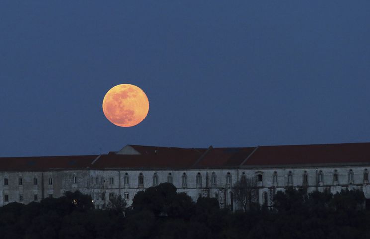 Photos: 'Super snow moon,' largest supermoon of 2019, lights up the sky