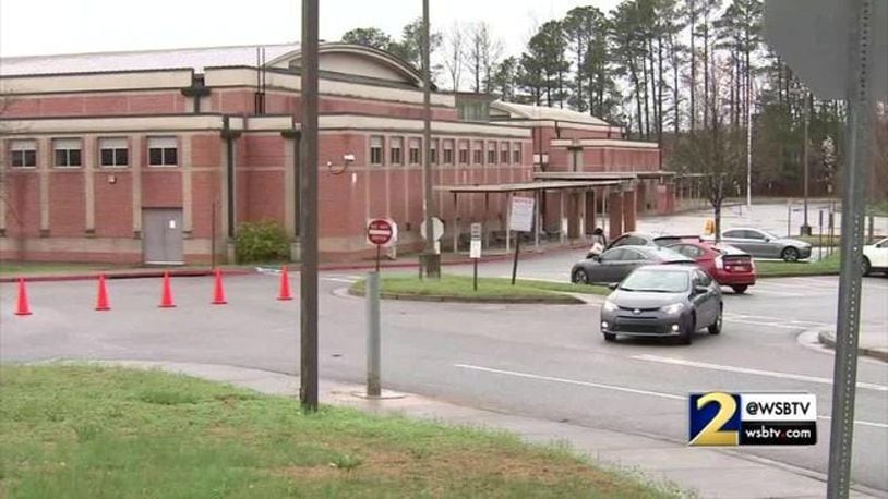 A Georgia middle school physical education teacher resigned after he accidentally showed pornographic images on his personal computer to sixth graders.
