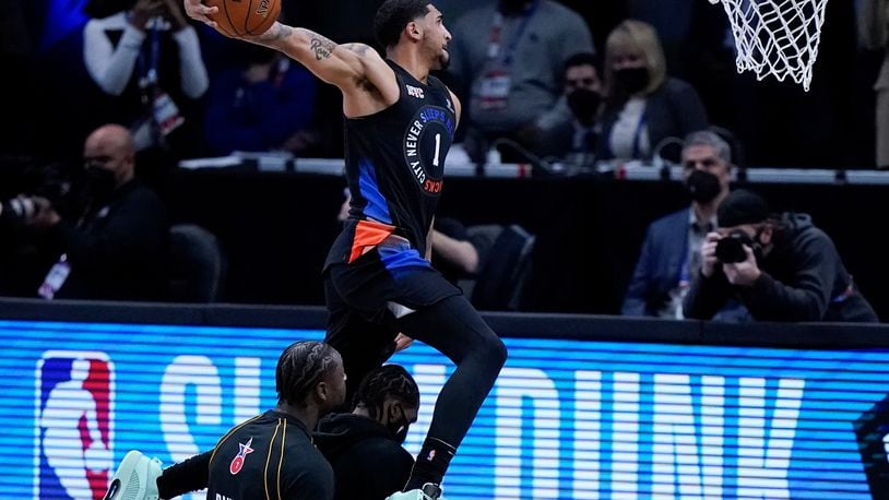 New York Knicks' Obi Toppin competes in the Slam Dunk contest during basketball's NBA All-Star Game in Atlanta, Sunday, March 7, 2021. (AP Photo/Brynn Anderson)