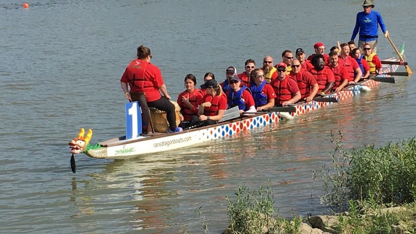 A dragon boat returning to the dock after a race. This was one of nine boat teams that competed in Saturday’s second annual Hamilton Dragon Boat Festival & Asian Cultural Festival. ED RICHTER/STAFF