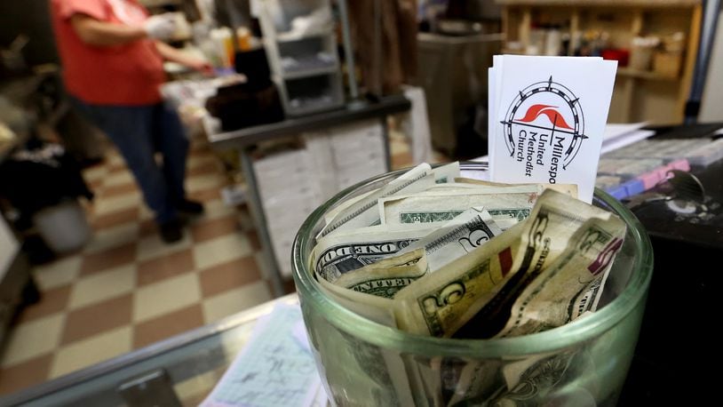 A full tips jar at Sammy J’s in Millersport, Ohio. Columbus Dispatch photo by Fred Squillante