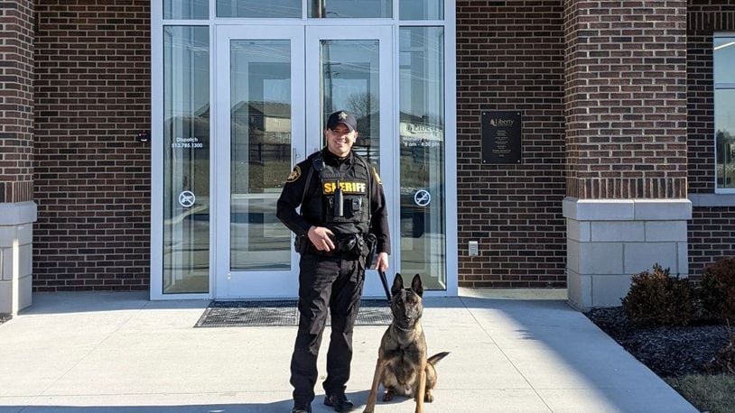 Butler County Deputy Anthony Wilmer with new K-9 Boris. CONTRIBUTED